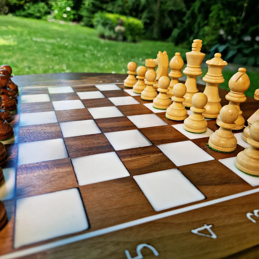 The only round chessboard, made of walnut and white resin, diameter size: 48 cm
