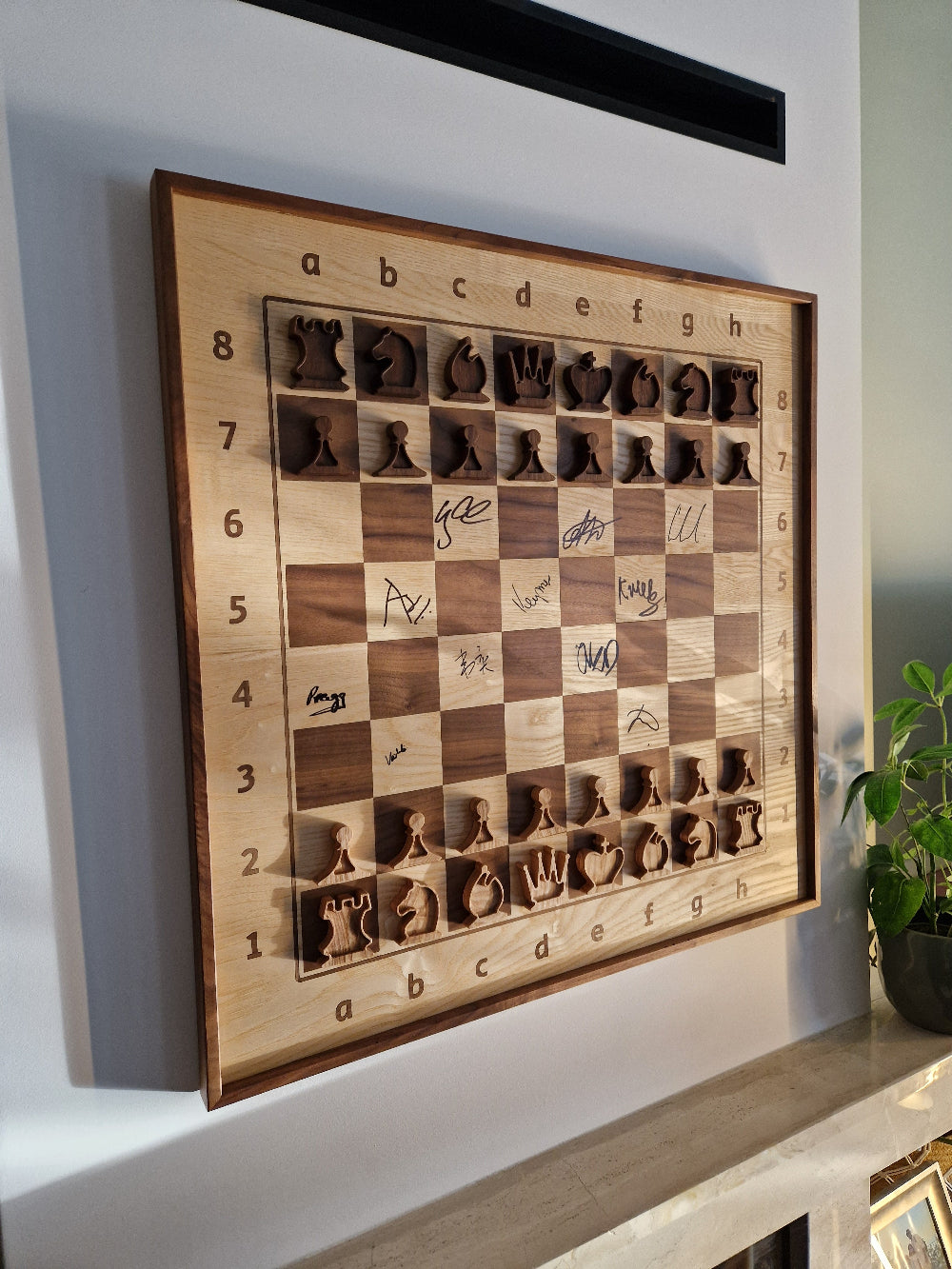 Chess with Magnus autographs in living room