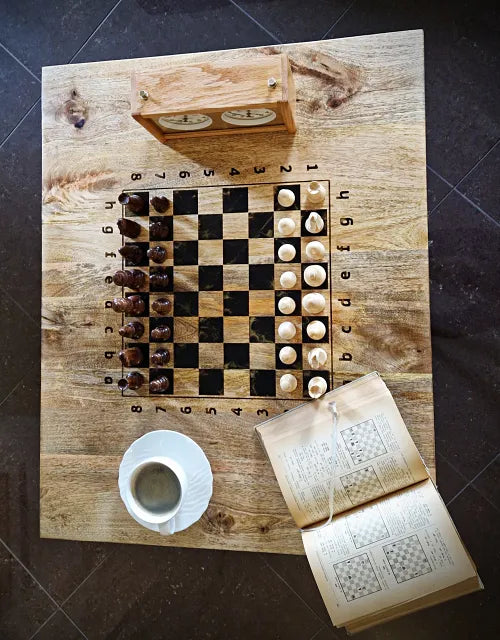Mango with black resin chess table