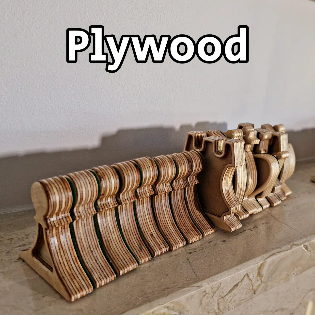 Full set of Plywood magnetic chess pieces lined up, showing the unique layered construction of the high-grade material.