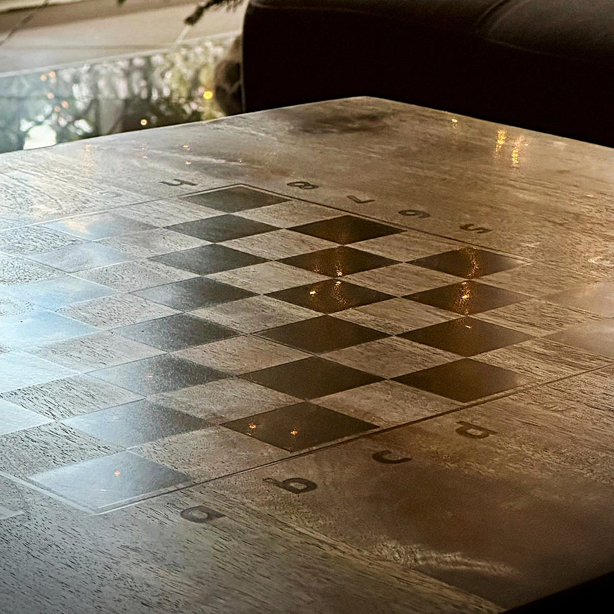 Surface of chess toptable with black epoxy resin