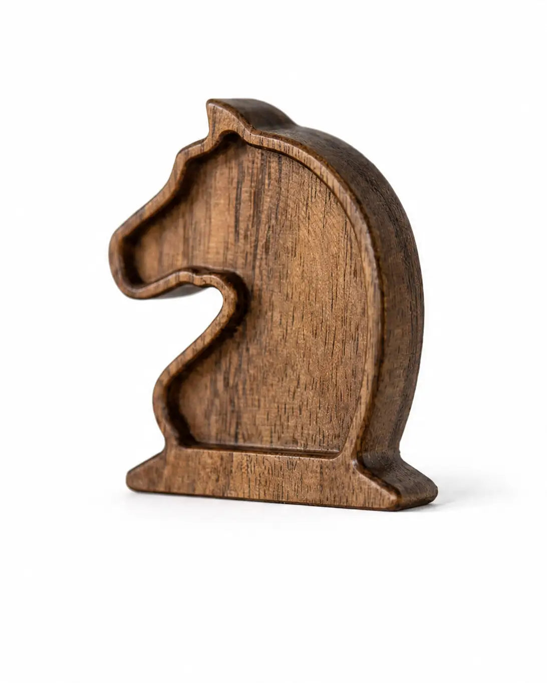 ChessboArt hand-carved wooden knight chess piece, isometric view on a plain background