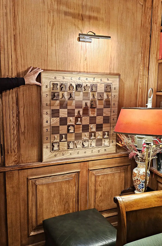 ChessboArt at Hotel Gródek in Kraków Old Town — chess set and clock in an elegant hotel bar