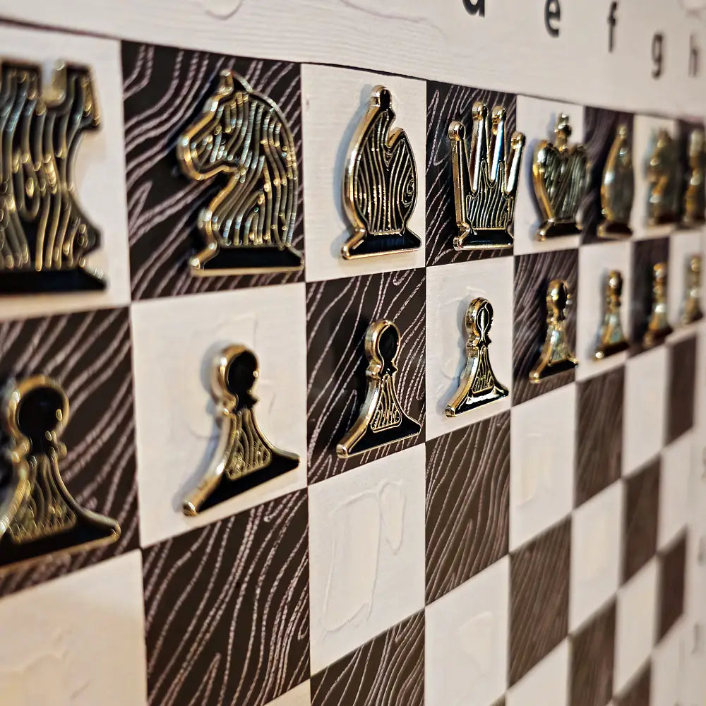 Close-up of enamel pin chess pieces on a vertical magnetic chessboard