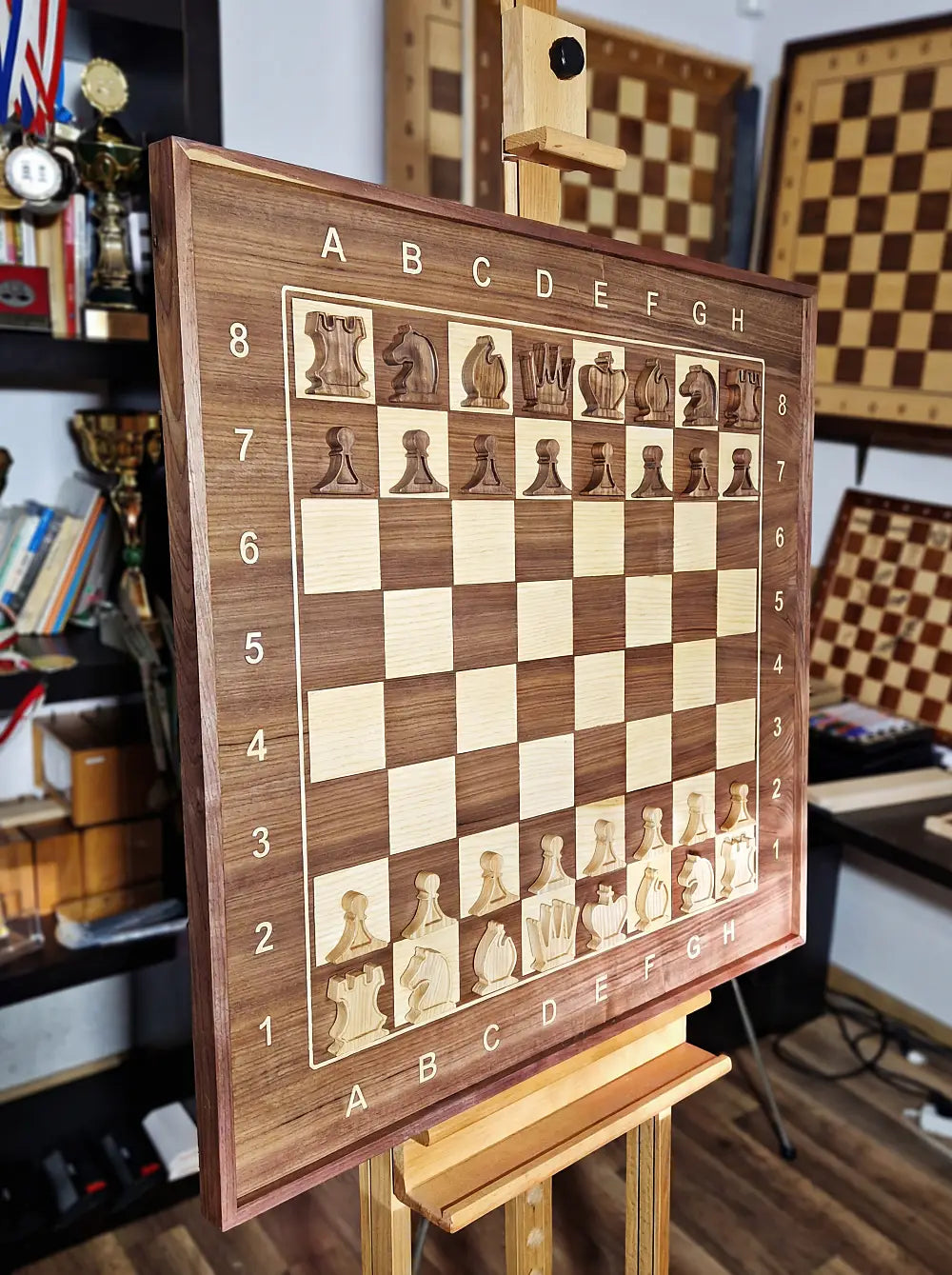 A beautifully crafted wooden wall chessboard with Arial font 