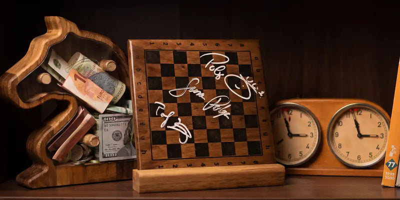 Close-up of a chess enthusiast's shelf with a signed chessboard, vintage clock, and books, showcasing a professional and artistic chess lifestyle