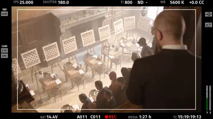 A frame from a historical film about chess, the Chess Olympiad, where chessboards 