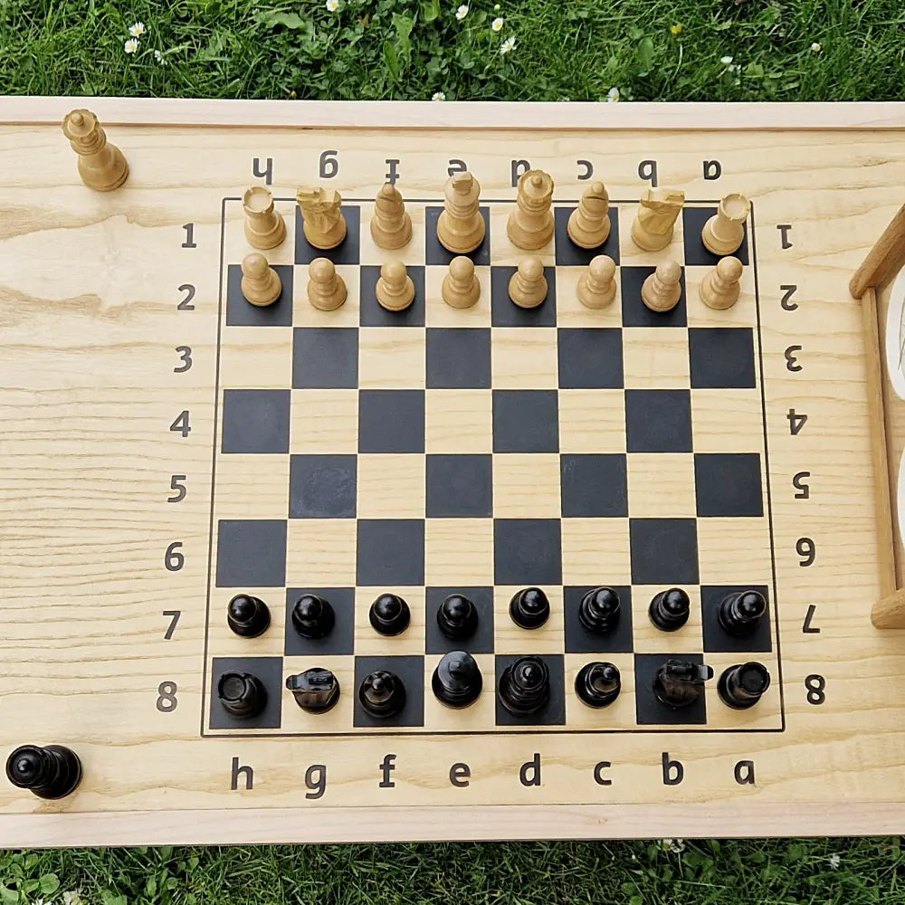 Ash and black epoxy chessboard in table