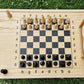Ash and black epoxy chessboard in table