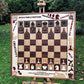 Creative and colorfull vertical chess set in autumn garden