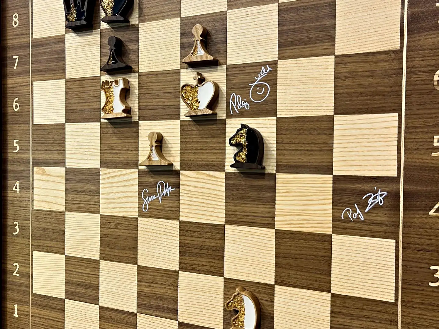 Judit Polgar signing the ChessboArt800 wall-mounted chess board — Chess Olympiad 2024, Budapest (EXPO)
