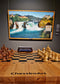Luxury wooden chessboard by ChessboArt displayed in an art gallery, with a chess clock and a painting in the background.