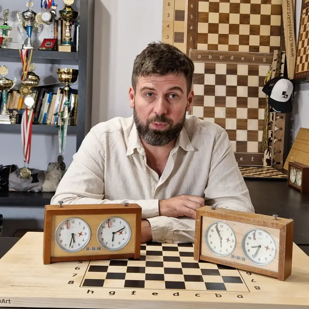 A classic, refinished wooden analog chess clock by MF Fudalej