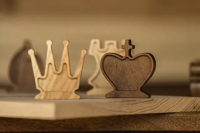 Wooden and magnets chess pieces by ChessboArt, hanging on fridge, King, Queen and Rook