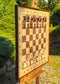 Wall chess board with pearl blue and white magnetic epoxy resin inlays, angled outdoor view