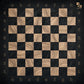 Empty Ebony Grain magnetic chessboard with a dark wood-grain finish, ChessboPIN by ChessboArt
