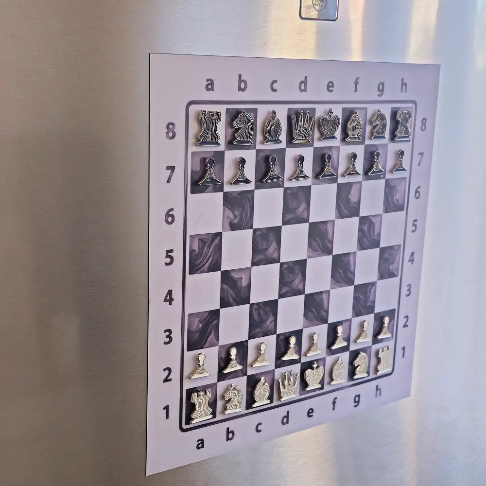 ChessboPIN magnetic chess set with Epoxy Ivory board mounted on a refrigerator, full starting position