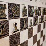 Hanging chess set with Ivory Canvas board in a mid-game position, wall-mounted magnetic chess