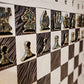 Hanging chess set with Ivory Canvas board in a mid-game position, wall-mounted magnetic chess