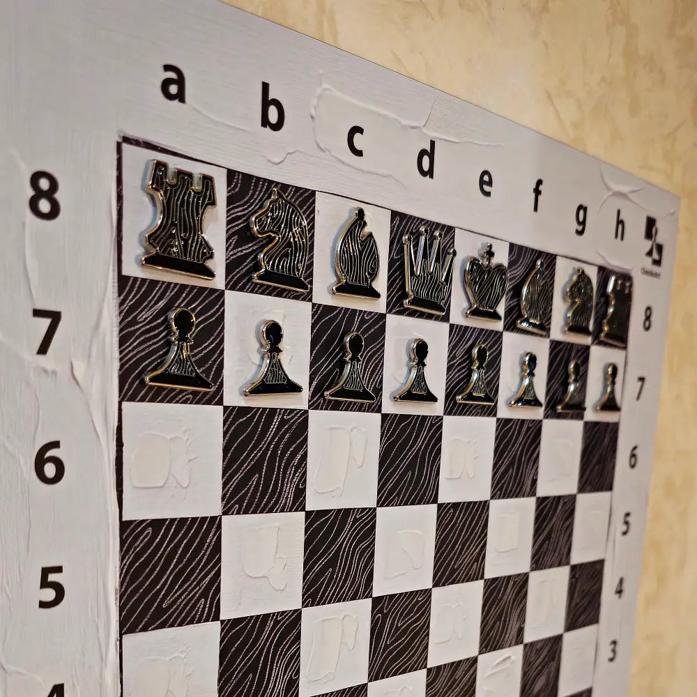 Corner view of the Ivory Canvas magnetic chessboard mounted on a wall with enamel pin chess pieces