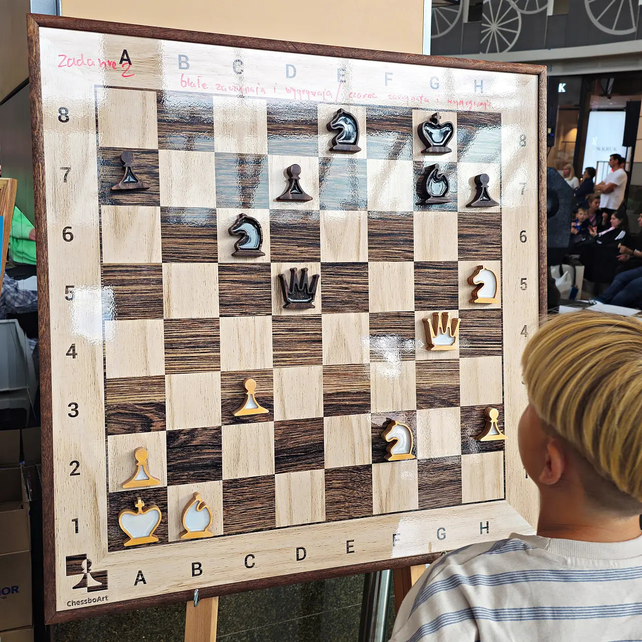 ChessClub demonstration chess board showing a puzzle at a tournament in Silesia City Center
