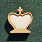 Chess king piece fitted with a white and gold two-tone magnetic epoxy resin inlay