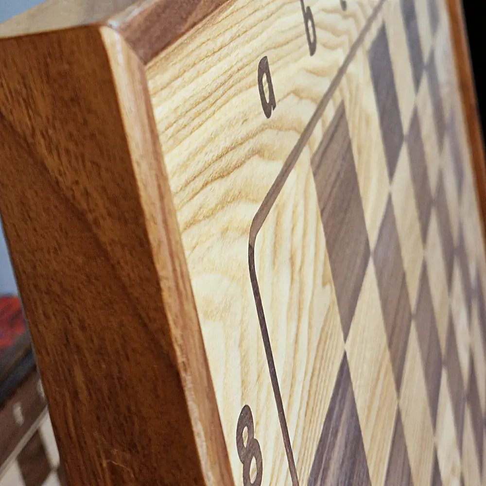 Close-up of ChessboArt800 wooden chess board surface in dark ash, highlighting handcrafted finish and natural wood texture