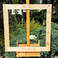 Birch side of a personalized double-sided wall chess frame engraved with a chess club name and federation logos