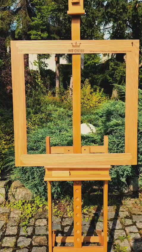 Video demonstration of installing the personalized double-sided wall chess frame onto the board using tool-free magnetic mounting