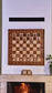 A chess trap shown on the ChessboArt800 demonstration board in the American Walnut version.
