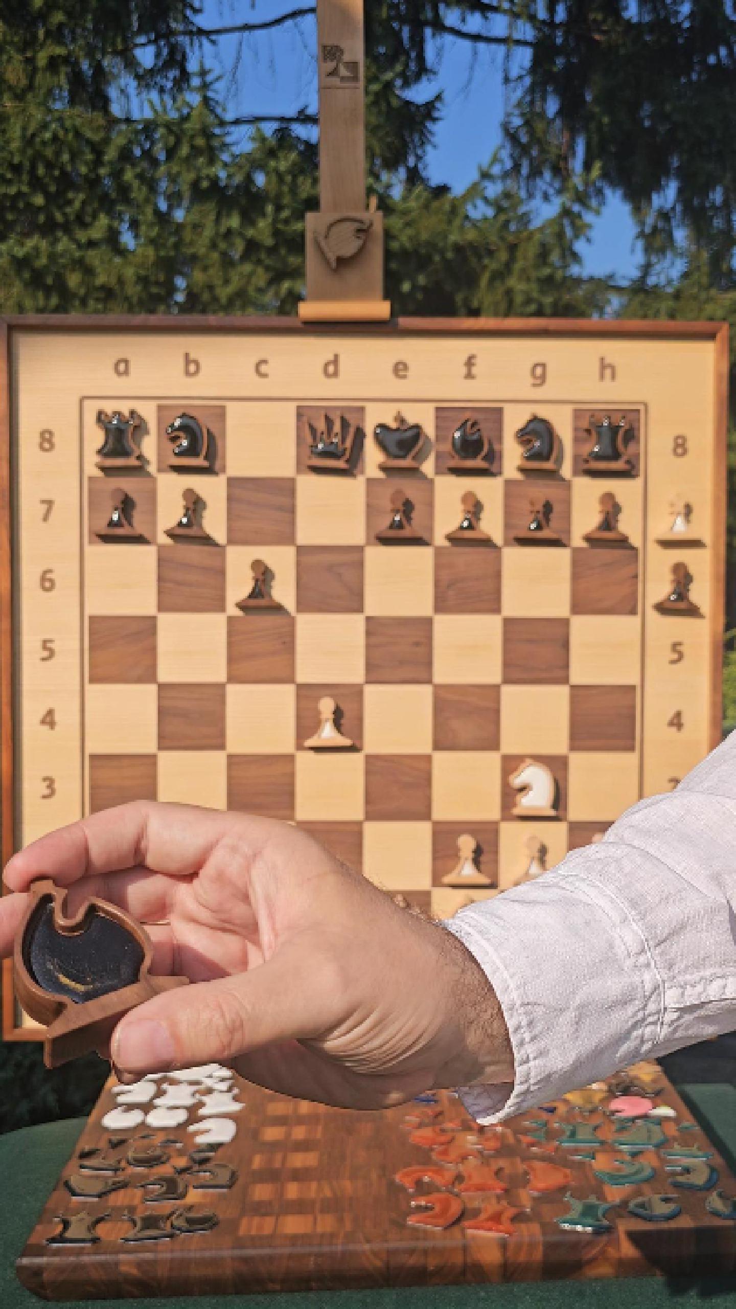 Demo video showing a magnetic epoxy resin inlay being inserted, held, and swapped in a wall chess piece