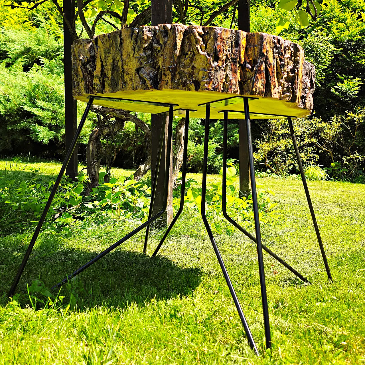 Side profile showing the 12cm thick solid walnut trunk and metal legs of the ChessboArt table.
