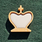 Chess king piece fitted with a solid white magnetic epoxy resin inlay