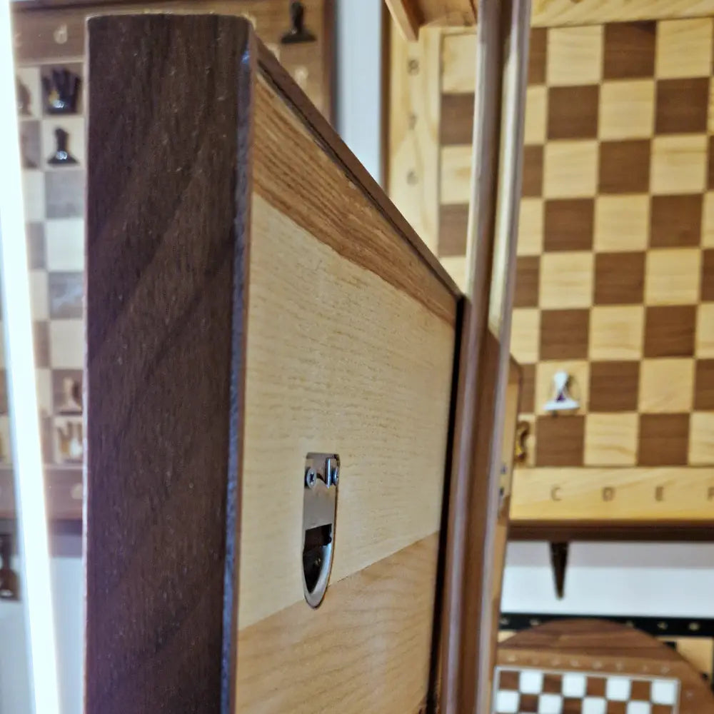 Hanging chess board ChessboArt800 installed on the wall, vertical chess board used as functional wall art in a modern interior